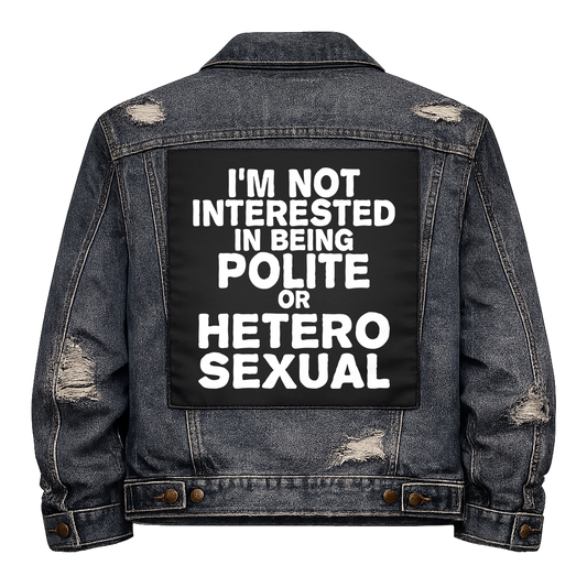 Black fabric back patch sew onto a denim jacket with the design "Not Interested in Polite or Heterosexual"